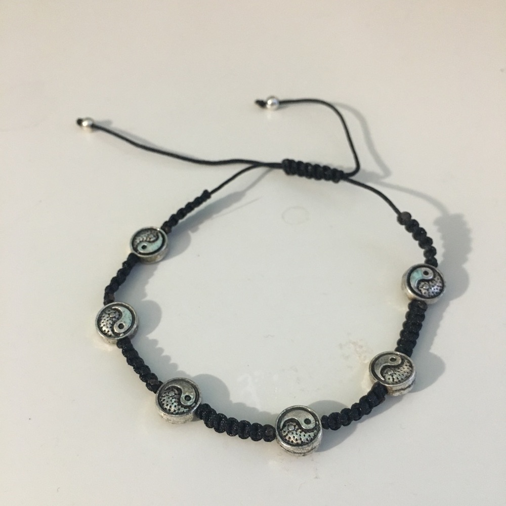 Black bracelet with charms